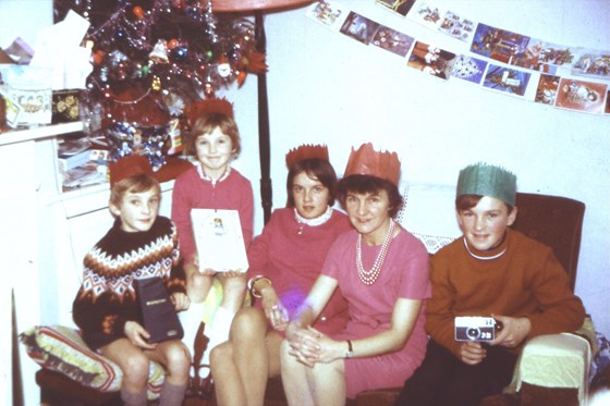 Ken and his family at a Christmas long ago