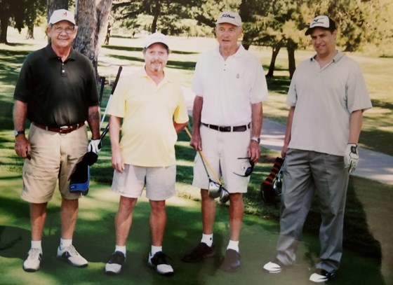 Al's golfing buddies - including his son Bruce to the right of Alan