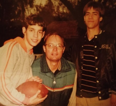 Andy & Bruce with dad in the 80's after a football game in the street