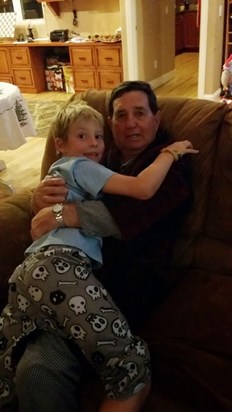 2013 - cuddles with grandson Jax