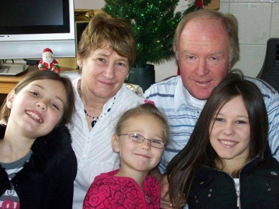 Lizzie, her beloved husband Dave & their three beautiful granddaughters, Kelly, Shaelynn & Tayler