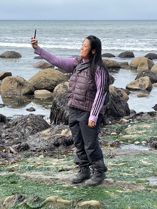 Practicing her selfie game at Bowling Ball Beach