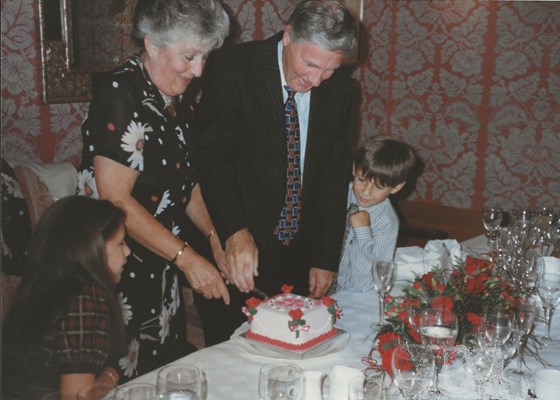 Marissa and James couldn't wait for a piece of that cake!