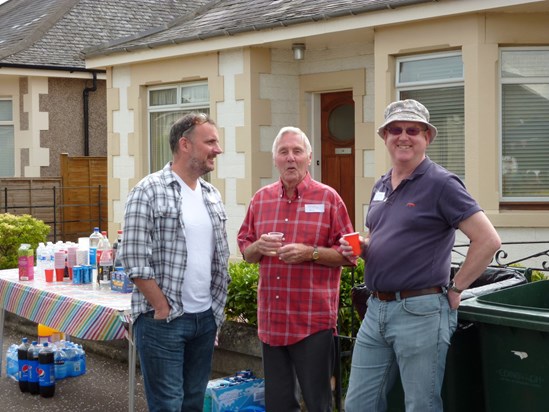 Ewen, Jimmy and Kevin enjoying a blether at the Allan Park street BBQ in 2016