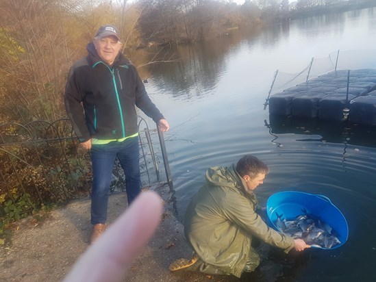 No, not giving him the finger! John supervising the stocking of bream at Norwood Lake in December 2019