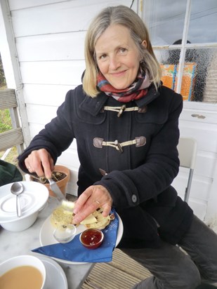 Ali enjoying a scone and jam !