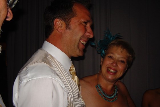 Laughing with David Seaman at Sol Campbell's wedding