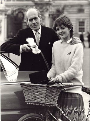 Leonard Cheshire and Elizabeth Cheshire outside Buckingham Palace after Leonard was awarded the Order of Merit.