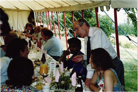 Leonard Cheshire talking with residents from the South African homes at Le Court fete