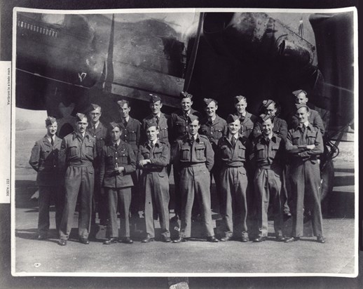 RAF personnel in front of aircraft (Halifax II), including Leonard Cheshire.