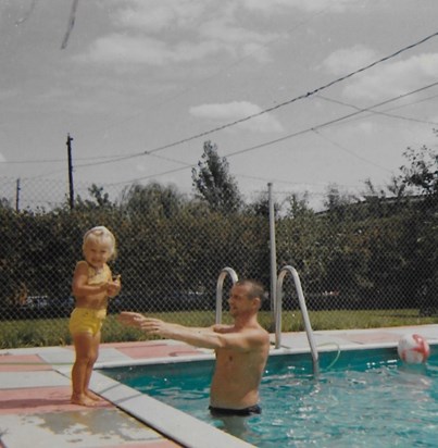 Dad with Deb in the pool in Canada