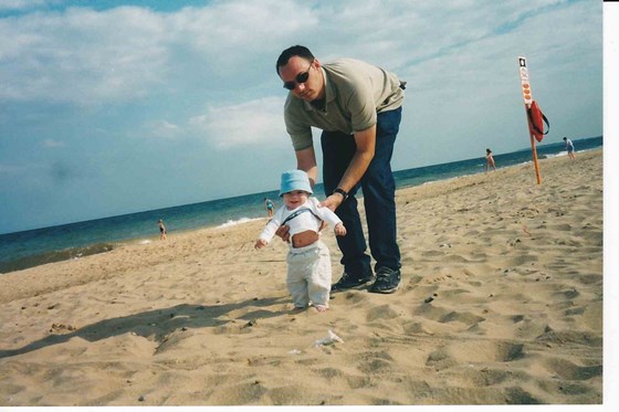 First time on the sand for Lewis with Daddy 