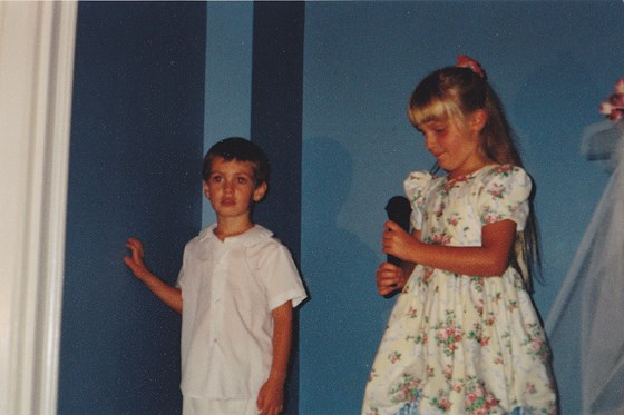 Megan and Ringbearer Sean at Courtney and Dan's wedding 9/12/97.  Megan is liking the mic.