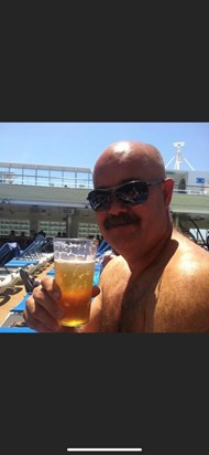 Potts doing what he loved best on holiday with a drink in his hand