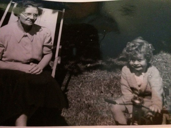 Peter on his tricycle with Grandmother Florence - look at that curly blond hair