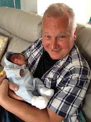 Dad was so happy when his first grandchild Charlie John arrived! March 2014