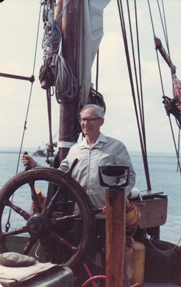 "Enjoying myself at wheel of Sailing Barge Scone" L. Dobson