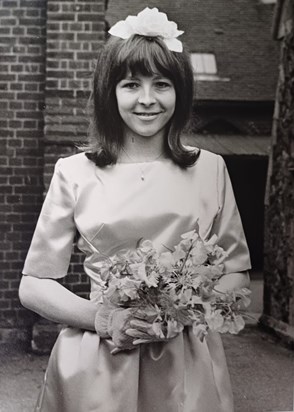 Young Joan as a bridesmaid 