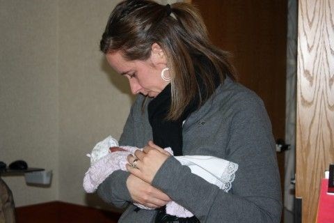 Shannon holding Olivia