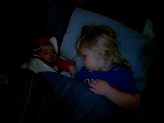 Laying with my little cousin Xander, (This was the morning before I went to Heaven)