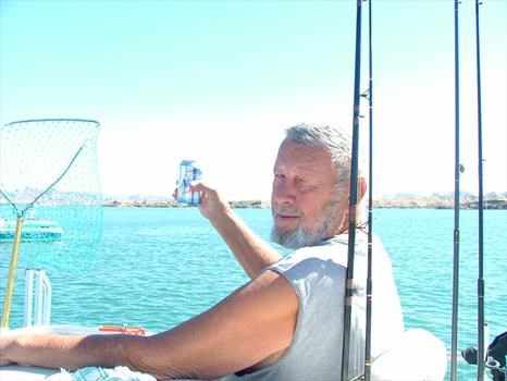 On Dad's boat fishing