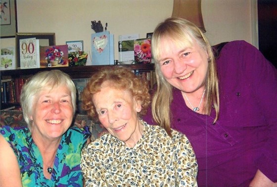 Joan with her two daughters Sarah and Louise on her 90th birthday.