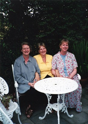 Three-sy does it: Patricia flanked by cousins Lynn (left) and Sandra wait for their cream teas to arrive