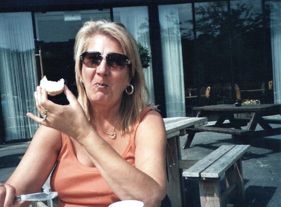 Bite delight: Patricia enjoys a scone during a cream tea