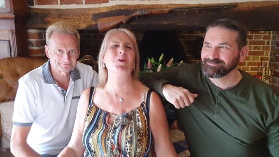 Birthday girl: Patricia is flanked by Kevin and Steve during a celebration at Frogpool Manor Restaurant