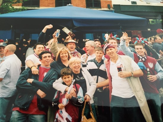 Liverpool final. John in beret and butchers coat! And a beer! 