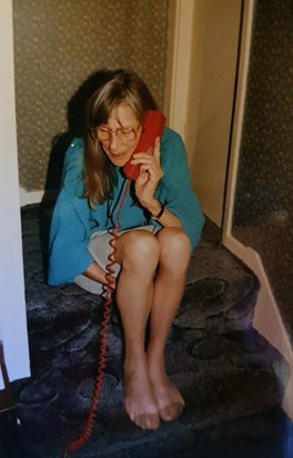 Mum on our trusty old red phone, 1990s