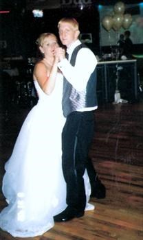Amy & Bobby dancing at her  wedding