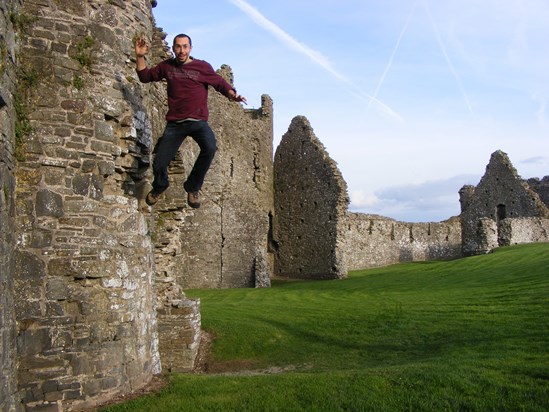 My favourite photo of Lee - taken as he jumped off a ruined wall in Carmarthen.