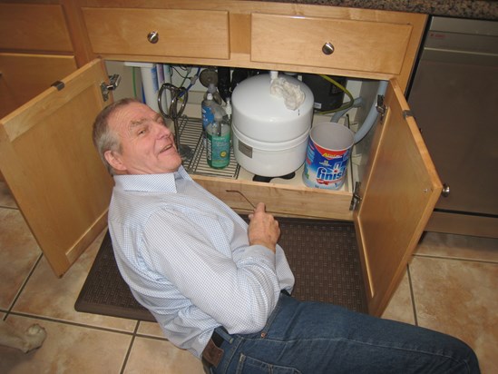 Bruce tinkering with my sink, Tucson, AZ, January 2011