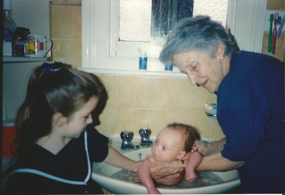 July 1994with granddaughter Maria (Jennifer's youngest) & baby Rebecca (Joanne's youngest)