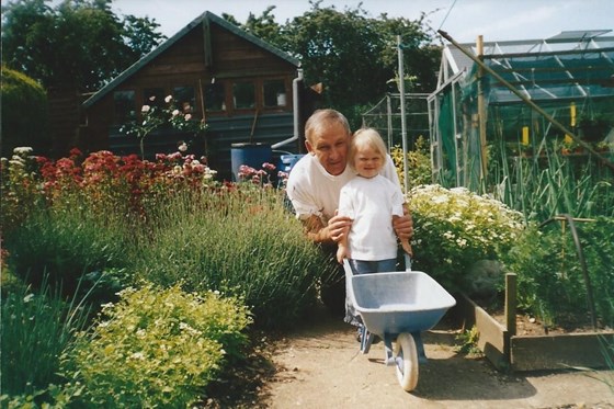 Sharing his love of gardening with granddaughter Skye