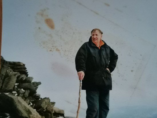 Dad posing on a mountain