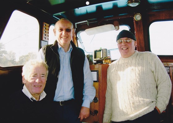 Graham, Richard and Roy, co-owners, on the Quest down river in 2006