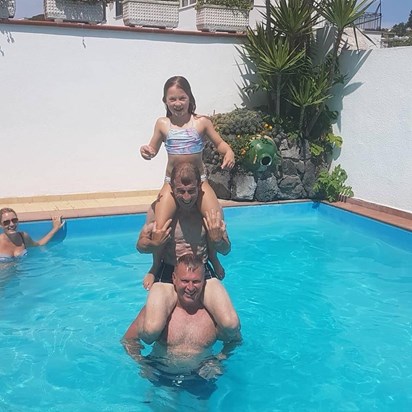 Pratting around in the pool in Ischia, Italy.