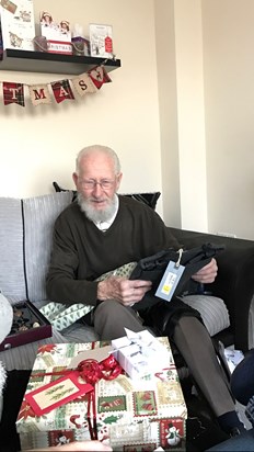 Christmas Day 2016 at Becky & Js - Grandad opening his presents and tucking into his chocolates. 