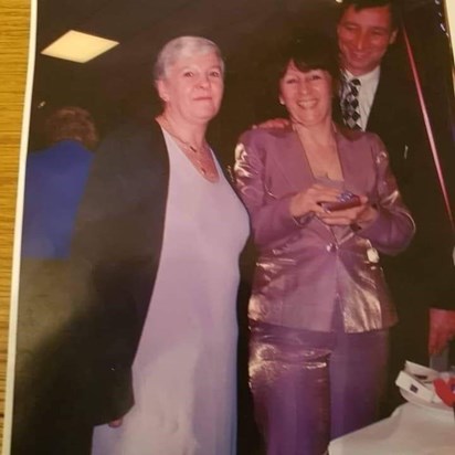 Martin with his wife Sue on her 50th and his late sister in-law Pam.