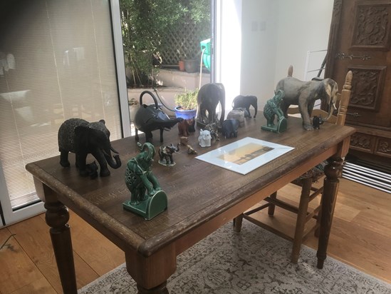Granna loved elephants .I can count 16 with one odd one out.