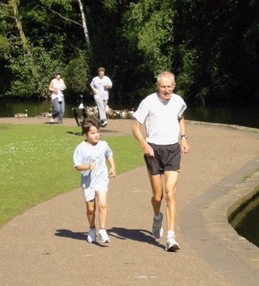 Dad and Louis running Bramhall parkrun