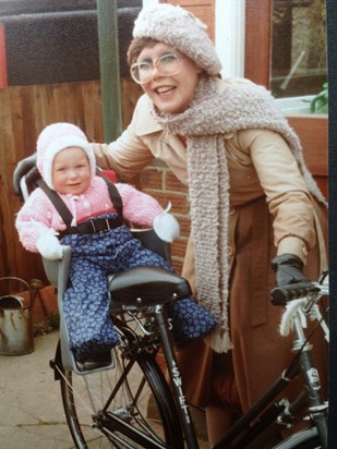 Judy loved her berets, her bikes and her babies, of course.