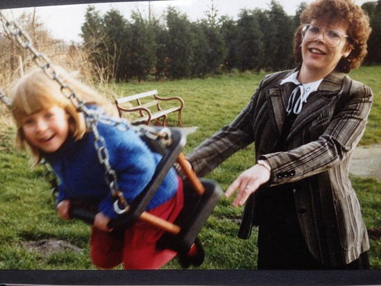 Judy would rather be on the swing than pushing it, but Ruth looks happy!