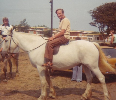 dad horse riding