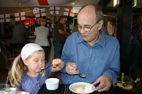 Annabelle & Grandad sharing ice cream at The Monument on Fathers Day 2010