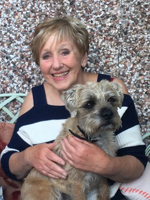 Mum enjoying a cuddle with Todd the terrier