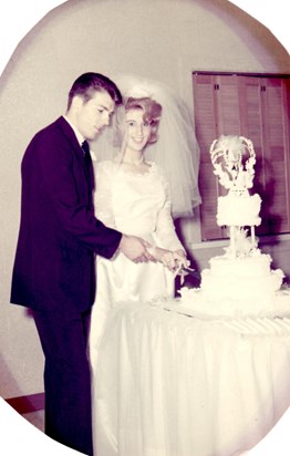 Bob and Carolyn Cutting Cake