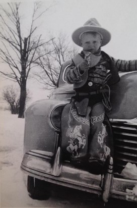 Early 1940's with his favorite cowboy outfit 